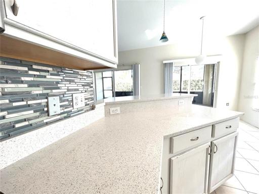 Tile backsplash with quarts countertops