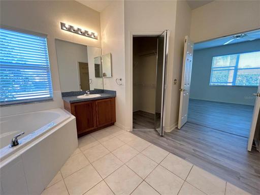 Two walk in closets in master bathroom