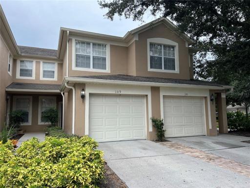 Exterior; condo is left side