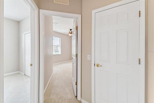 View into Guest Rooms & Linen Closet in Hall