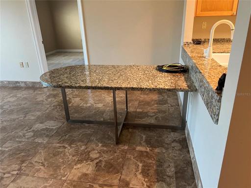 Attached granite dining table