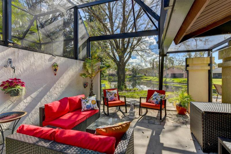 Enjoy the side porch with the awesome view of the lake