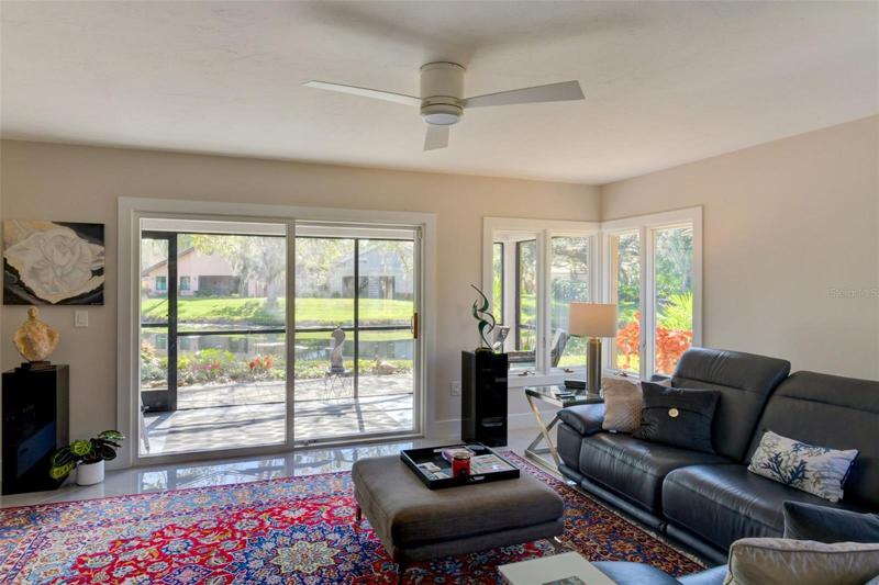 Exit to the back porch through the glass sliding doors