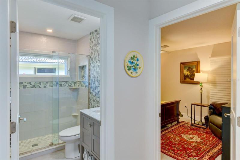View of the beautifully renovated guest bathroom and the third bedroom