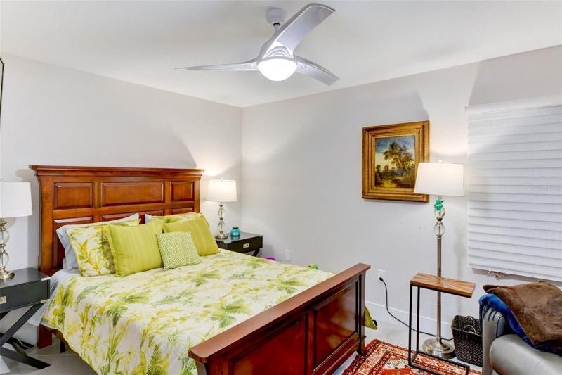 Third bedroom with ceiling fan