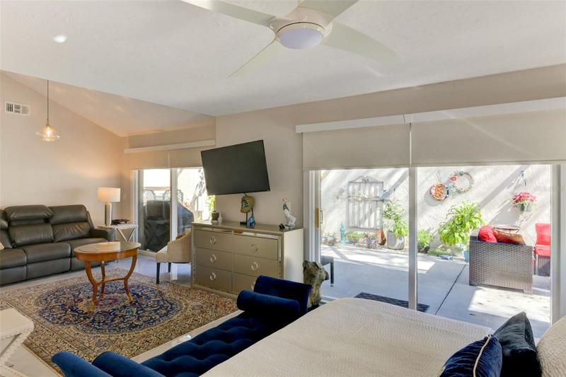 Spacious main bedroom with seating area