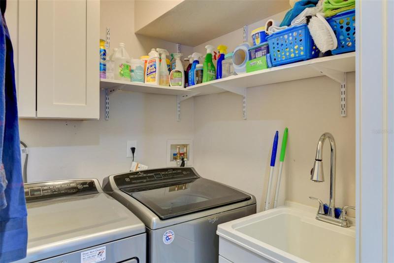 Laundry room is off the third bedroom with utility sink