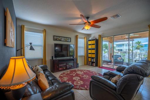Spacious family room w/sliding glass doors leading to lanai.