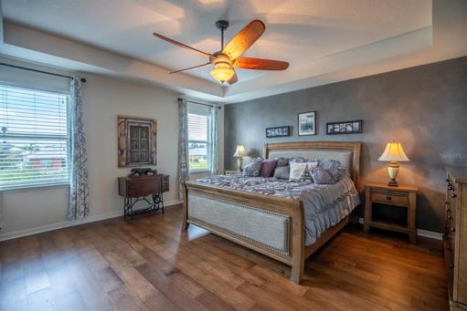 Large Master bedroom with amazing view of the water.