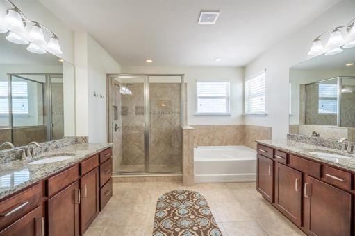 Master Bath has dual vanities.