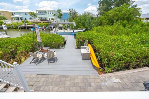 Composite decking and brick pavers.