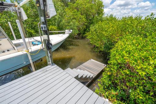 Step going down to water for easy access to launch water toys.