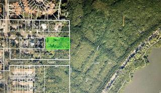Total sq.ft. is 26480 and includes 85x113 (9605 sq.ft.) of vacant residential land and 150x113 (16950 sq.ft.) of wetland.