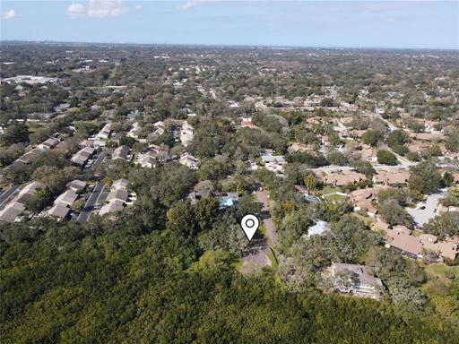 Amazing corner lot at the end of the street - build your dream home in a private backyard with beautiful water views of Old Tampa Bay