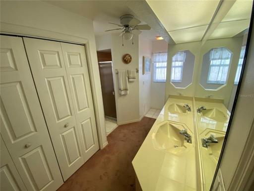 Master bath - view 1.  Linen closet on the left; shower door just past the closet.