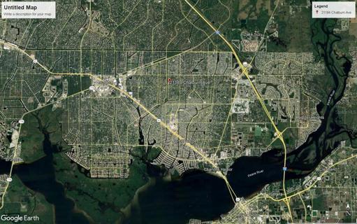 Zoomed out aerial showing this home's central location.