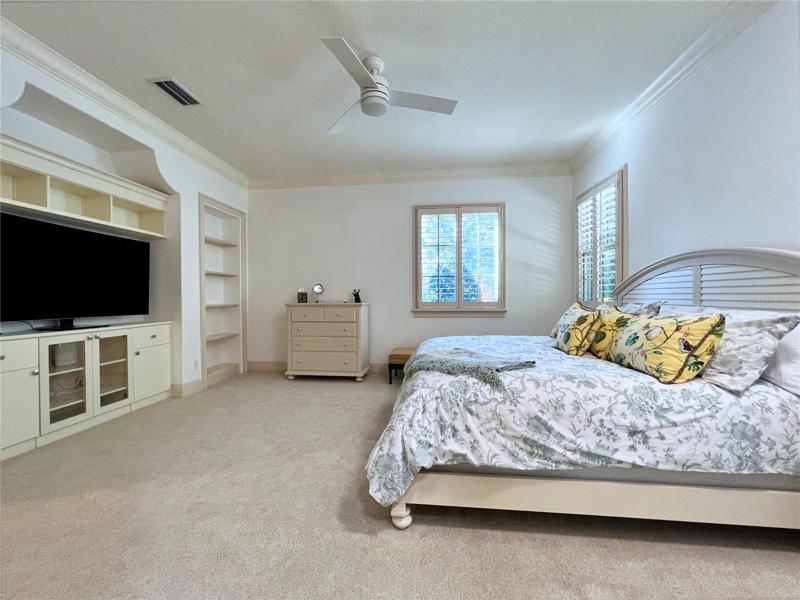 Sizable second bedroom suite on first floor - appointed with en suite bath and walk-in closet