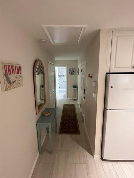 Entry walkway past front door