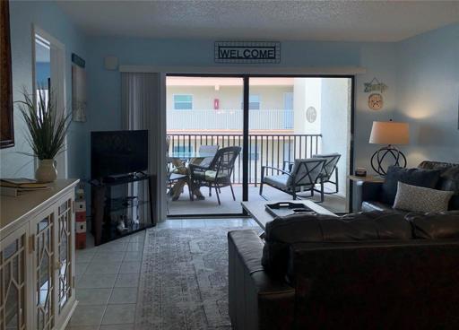 Comfortable living room with balcony access