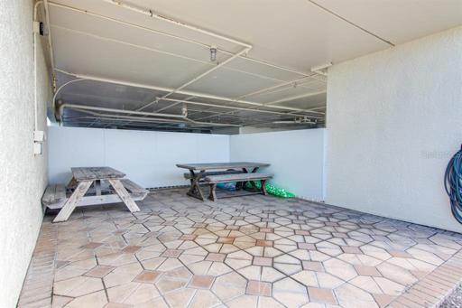 Picnic tables by the grill space