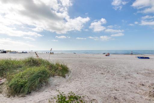 Miles of sugar sandy beaches right behind the building!