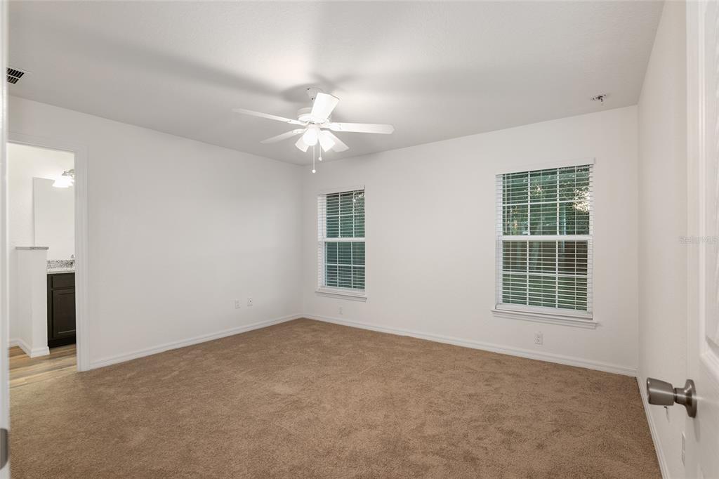Step into the Master Suite with carpet for your feet.