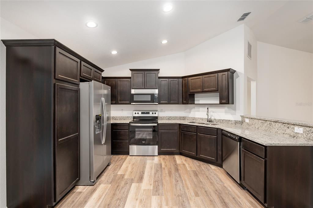 Full Kitchen with Wood Cabinets