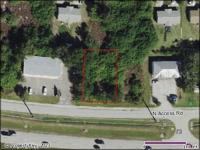 10,000 sq ft lot zoned CG next door to Sherwin Williams