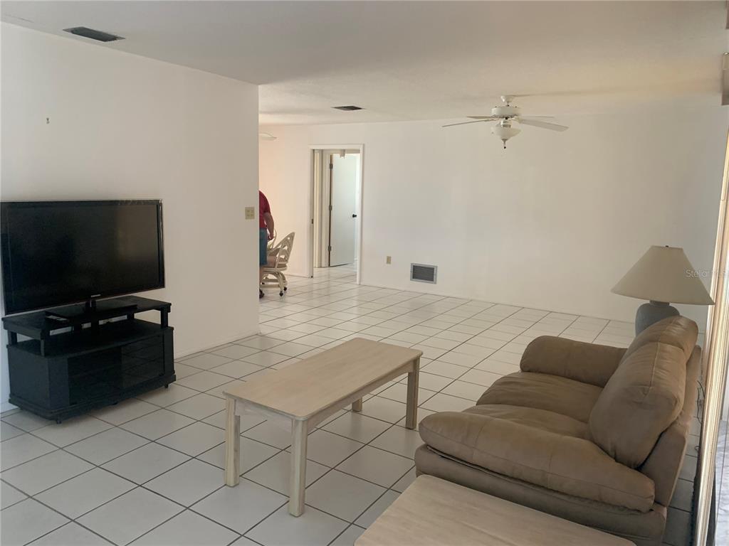 Living room leading into dining area. 