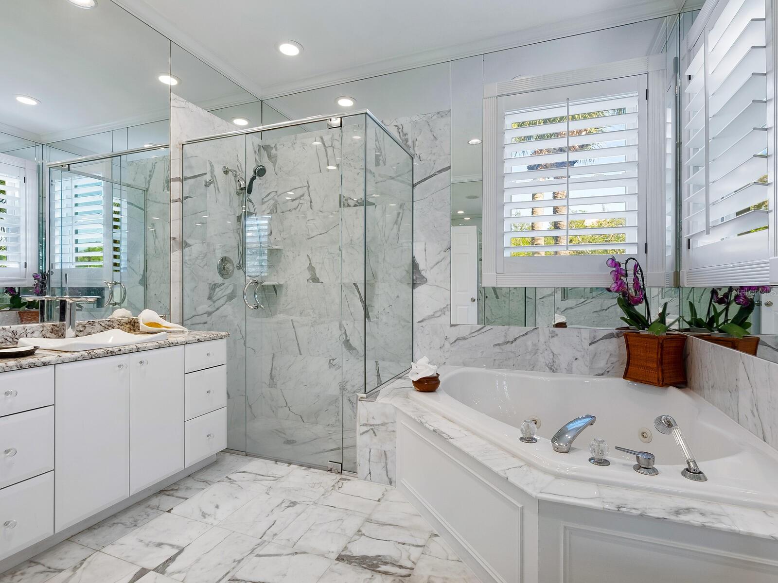 Beautiful crisp &amp; clean Carrera marble throughout