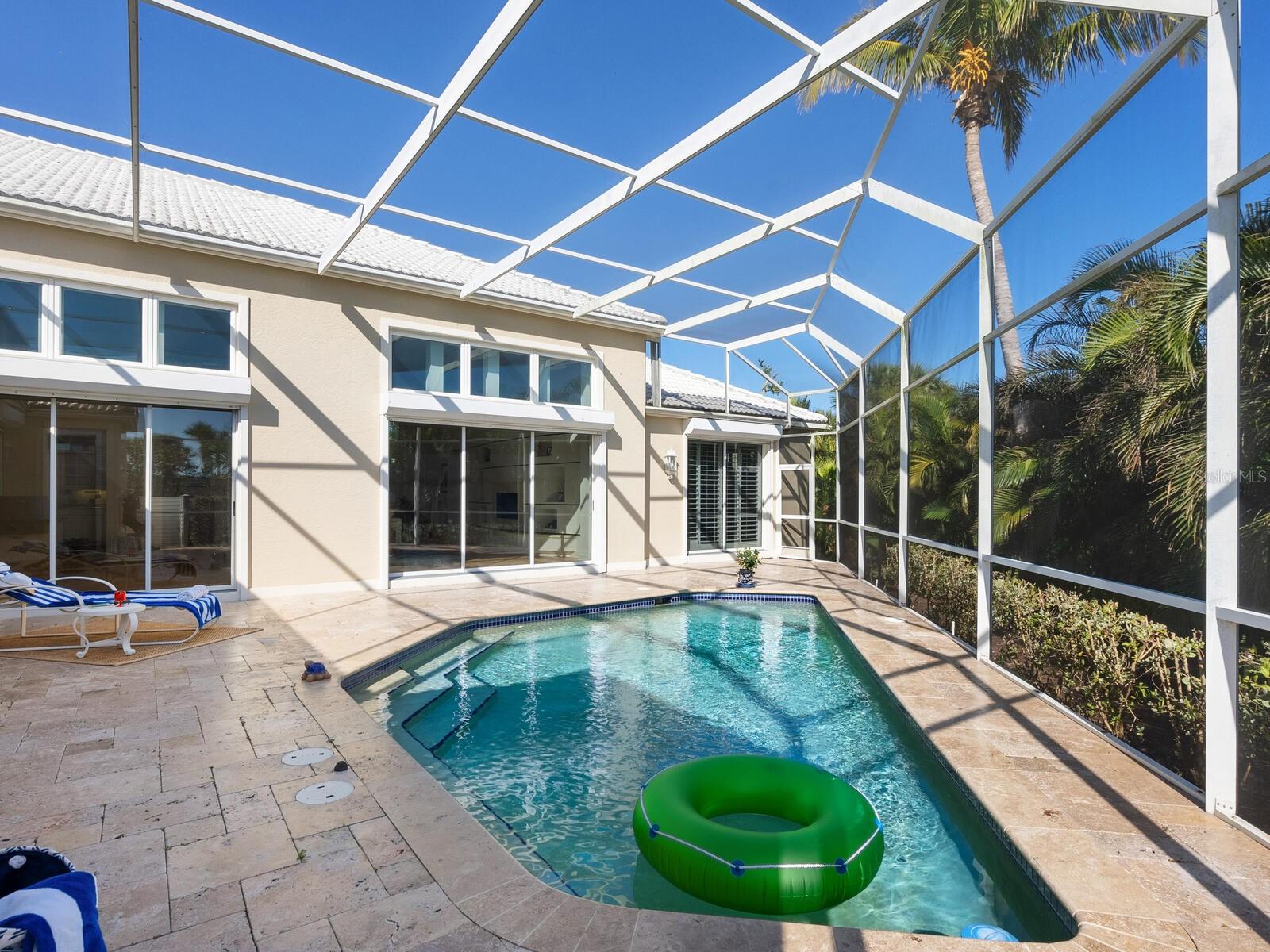 Gorgeous sunlight refracts from the pool cage perfectly