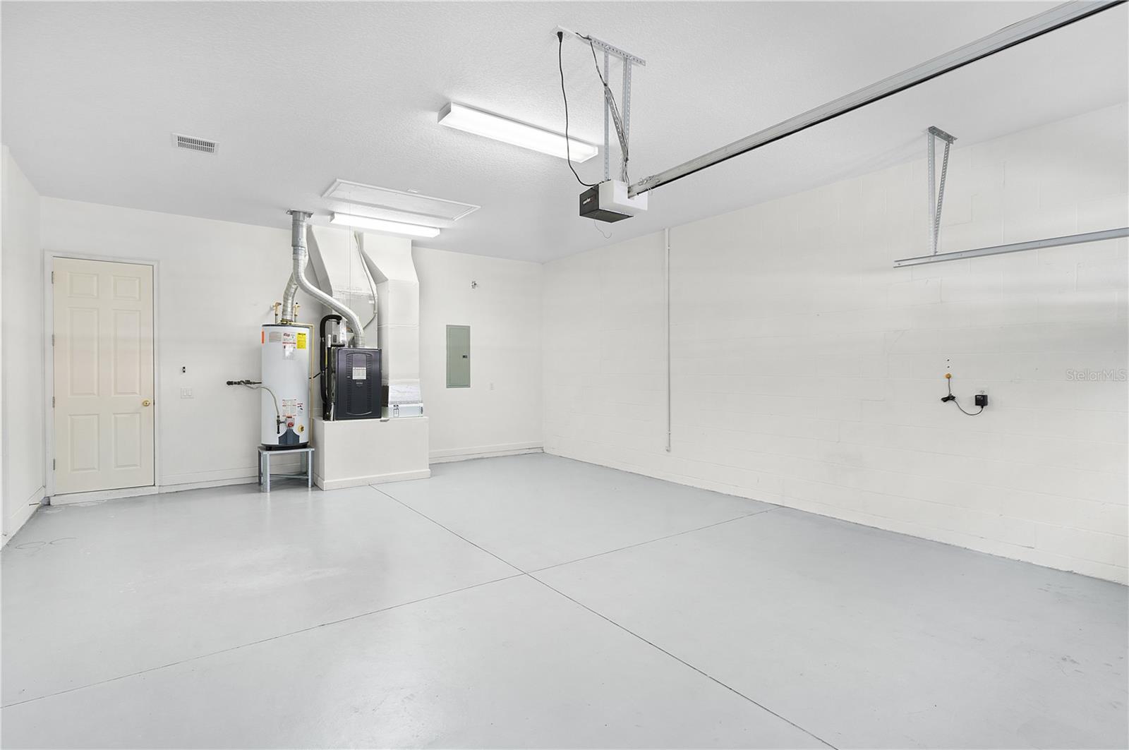 Two Car Garage with Gas/ Electric HVAC With Filter System. Gas Water Heater