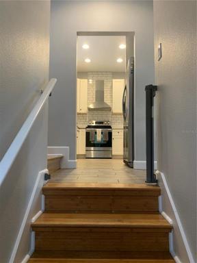 Stairs to Living Area and Kitchen
