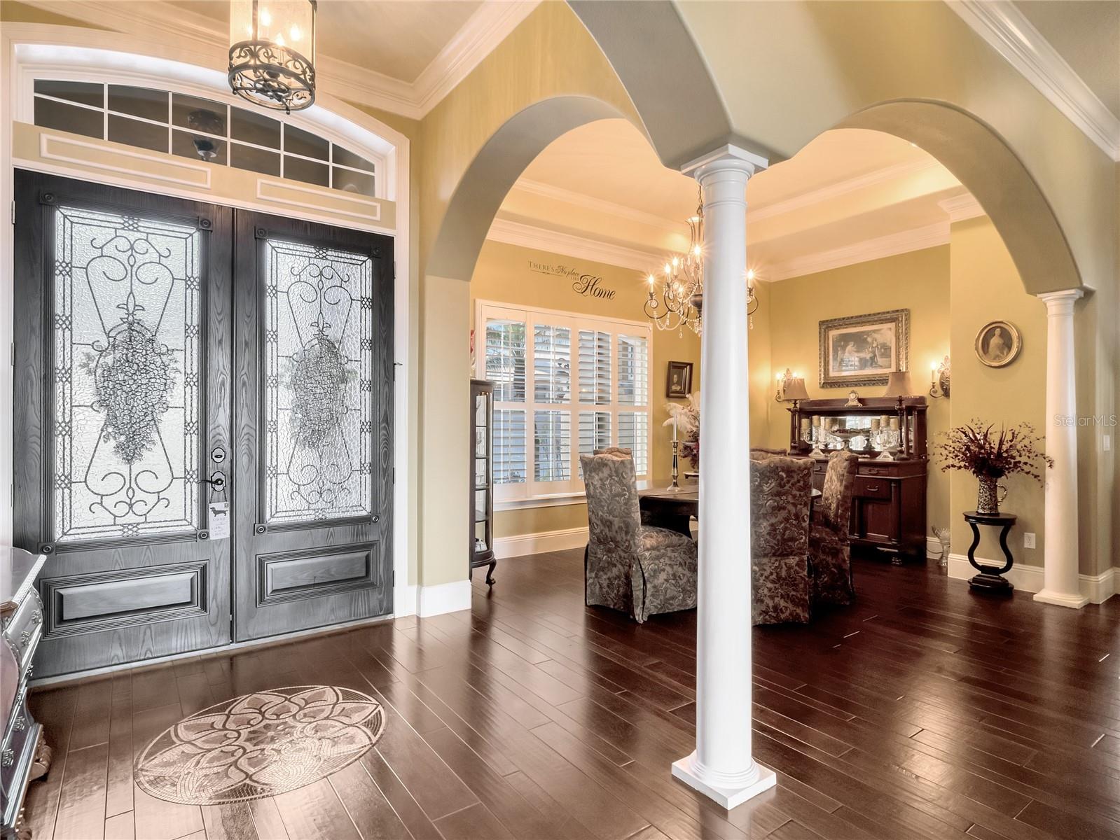 Grand entrance area with formal dining toward the front of the house
