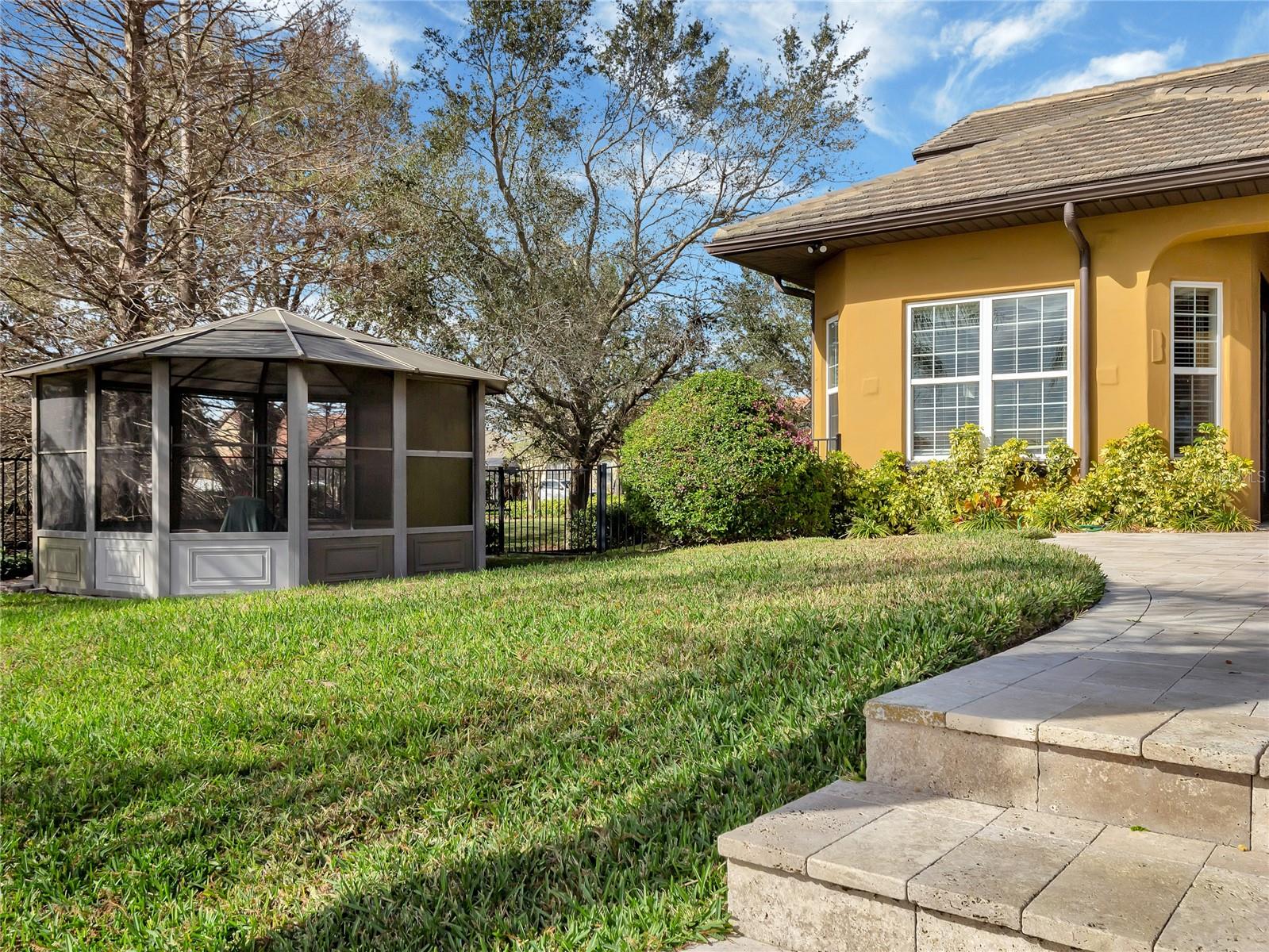 Enclosed Gazeebo conveys with property