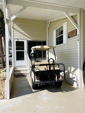Golf Cart parking or screen it in for seating