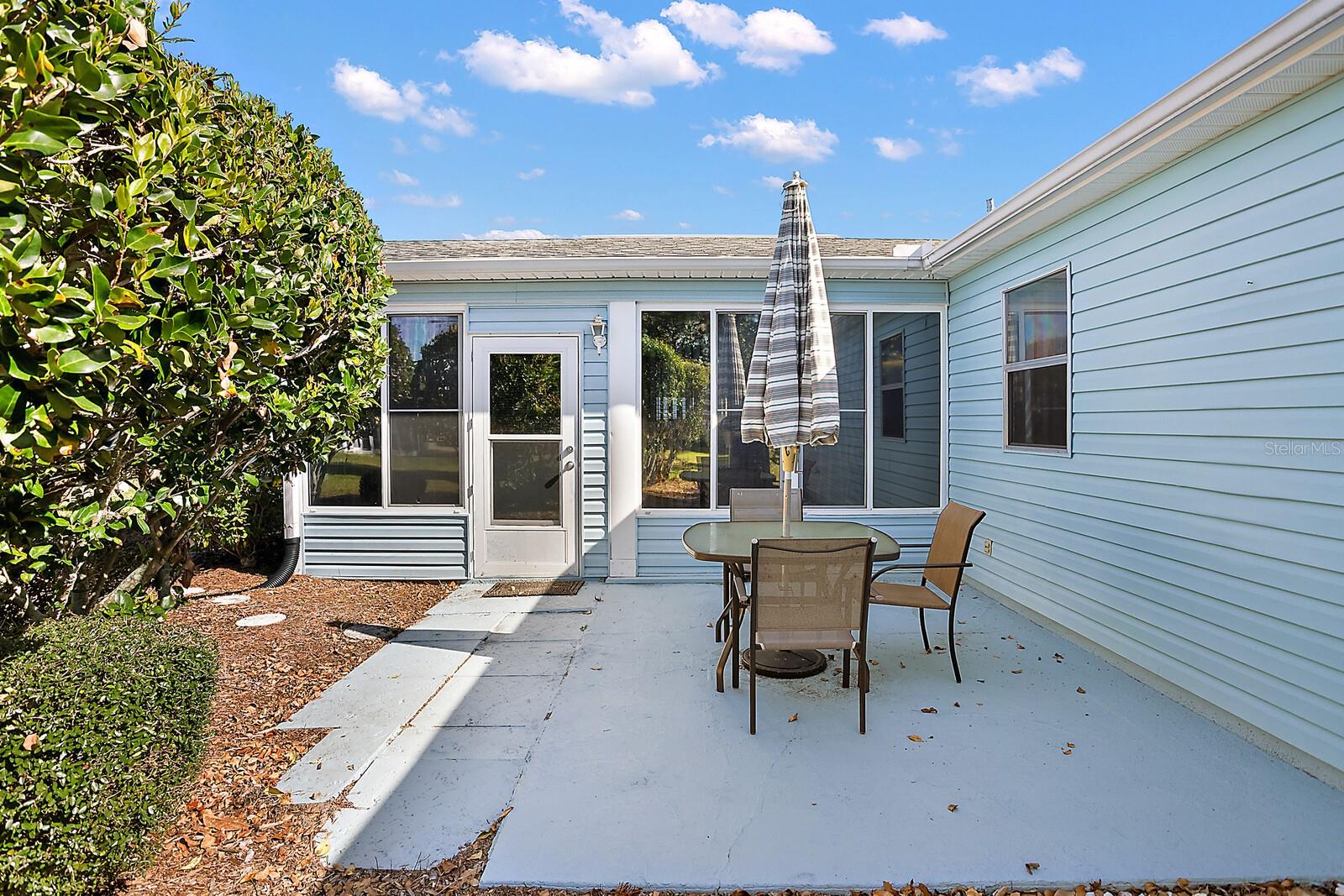 Rear Patio Located off The Florida Room