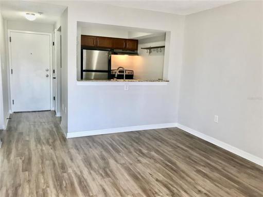 Living space open to Kitchen. Luxury LVP flooring new in 2020.