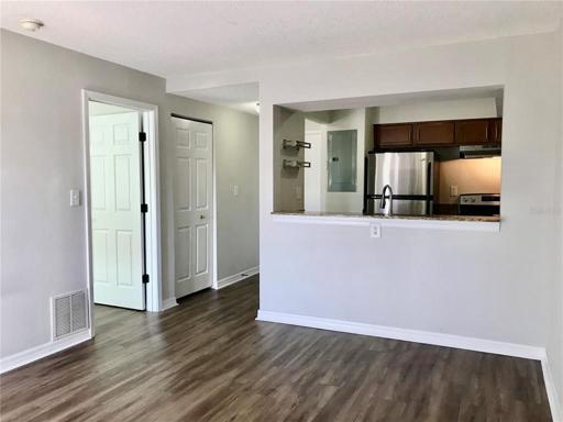 Living space open to Kitchen. Luxury LVP flooring new in 2020.