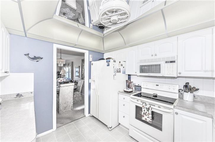 Kitchen with updated cabinets and counter tops