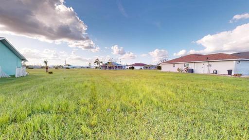 The rear of the lot is wider, and also adjacent to the Greenbelt, which adds to the open feeling of the neighborhood.