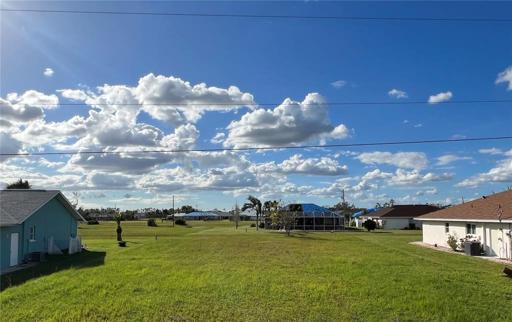 Front of home would face East, Relaxing Sunset views from your lanai or rear lawn.
