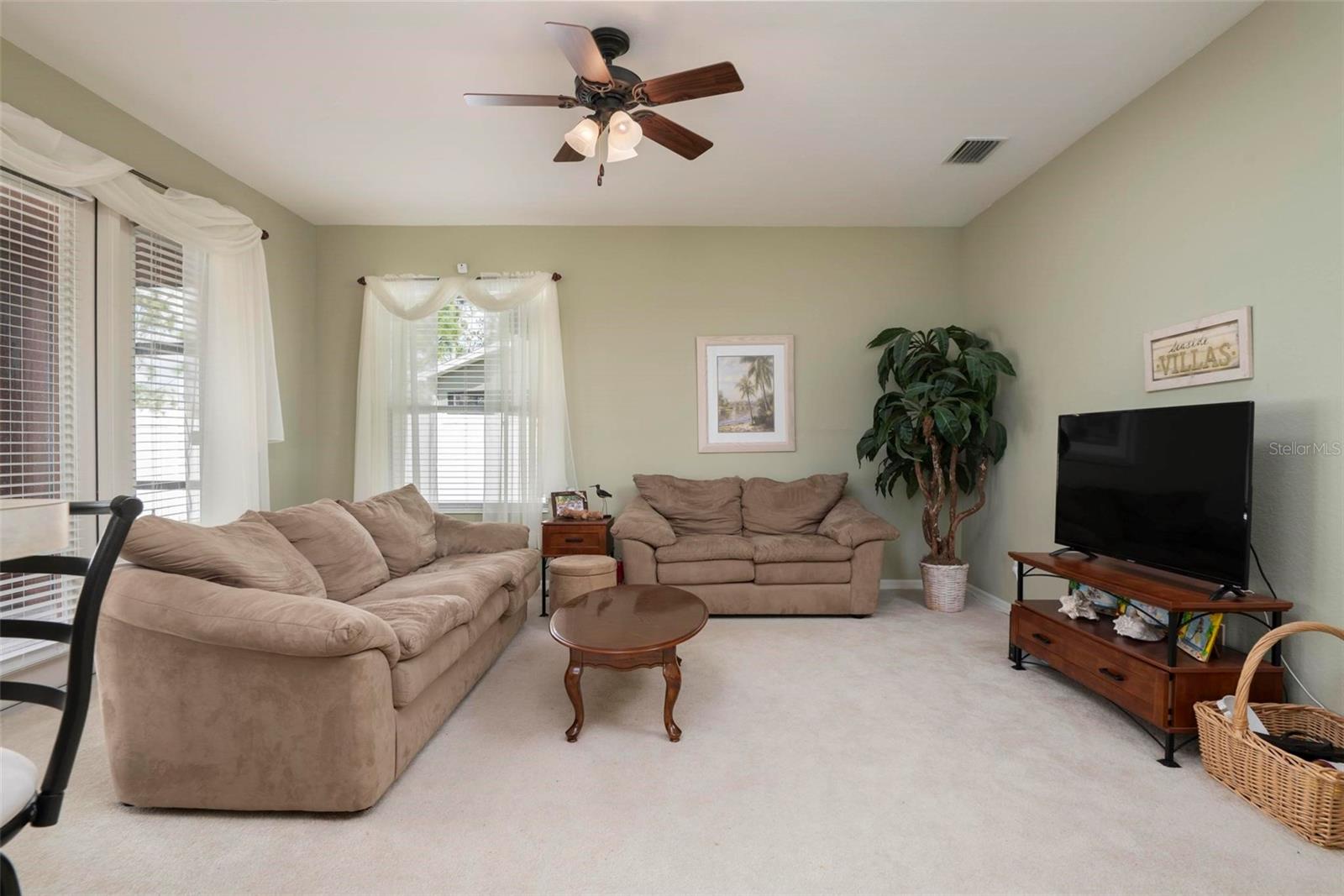 Family room with French doors leading to the lanai