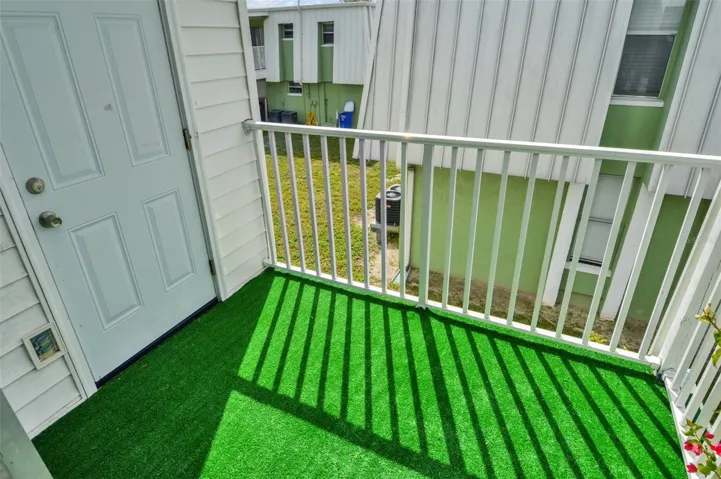 balcony with storage closet for water heater and washer/dryer hookup