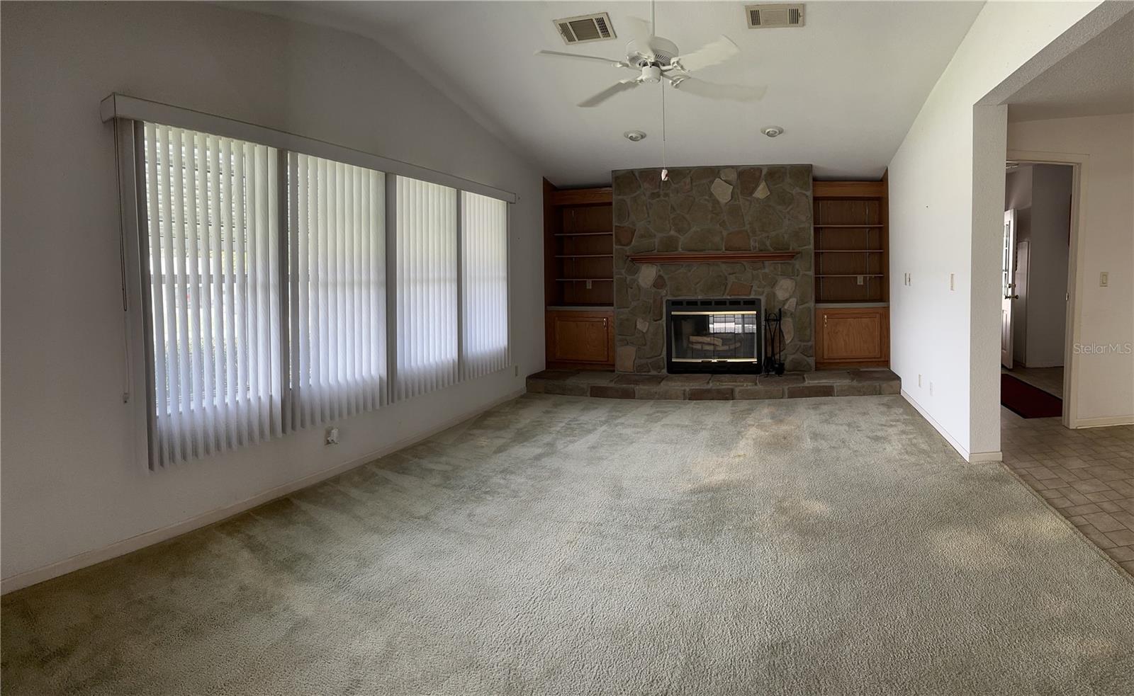 Family room/ built-in shelves and wood