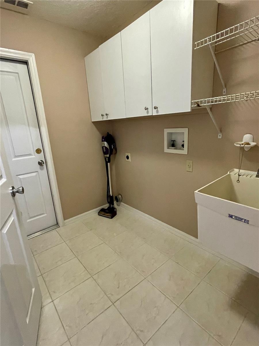 Laundry room, door ahead leads to the 2 car garage