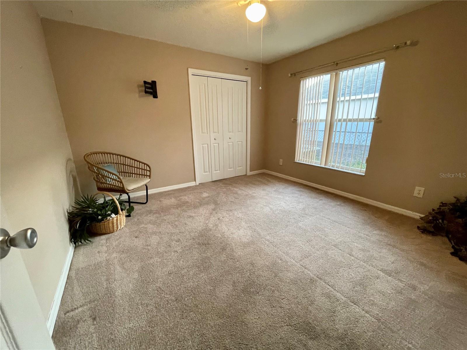 2nd bedroom, large closet, with organizers