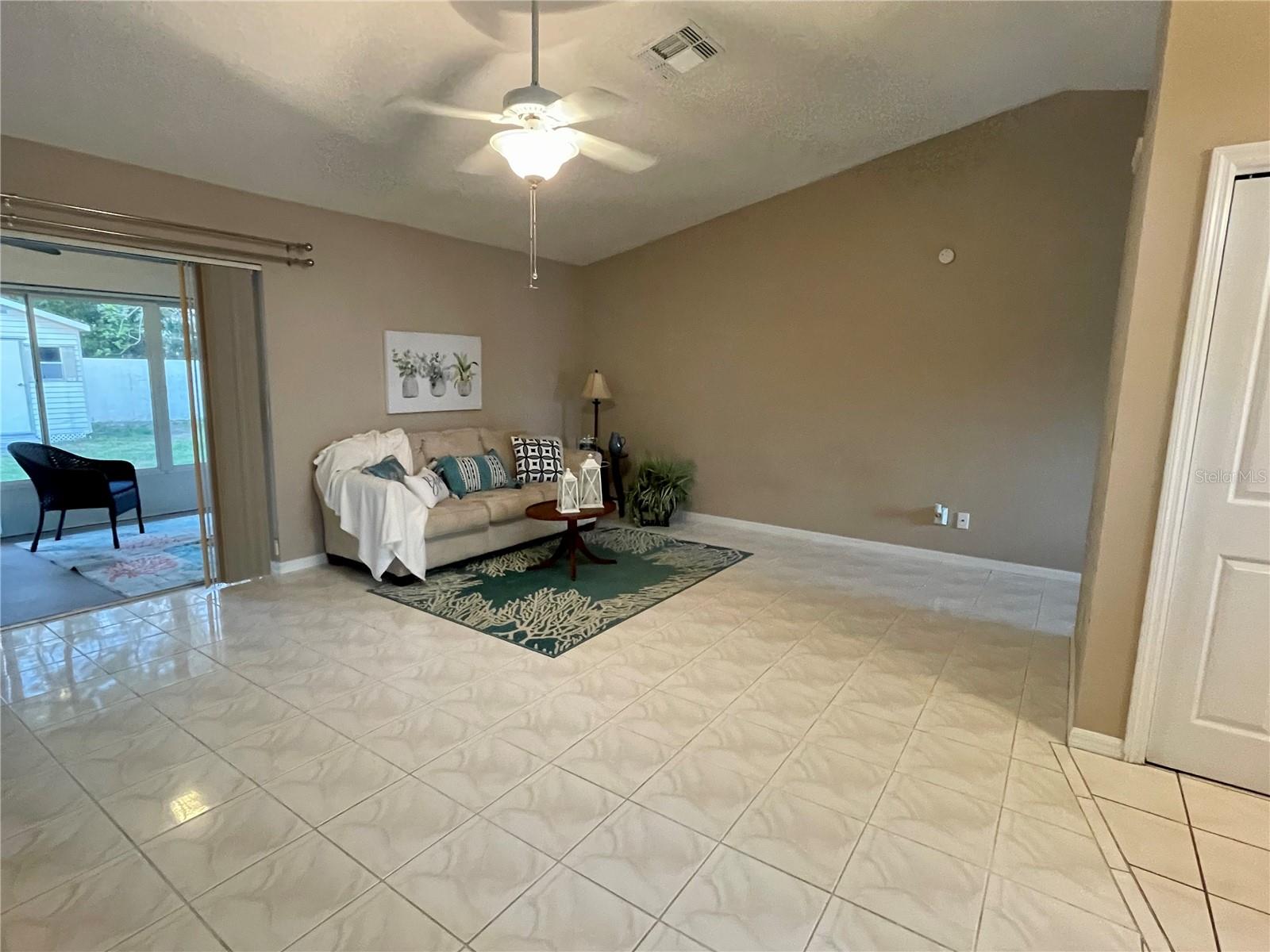 This is a very large living area, cathedral ceilings, very spacious room.