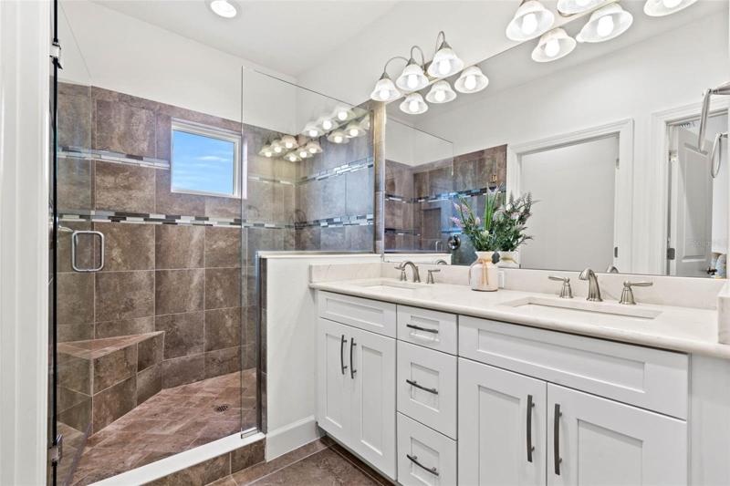 Clean and bright master bathroom.