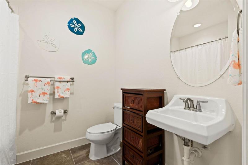 Guest bathroom with tub